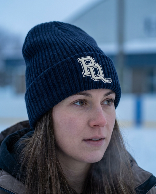 Navy cuffed Puck Queens toque with the PQ monogram embroidered on the cuff