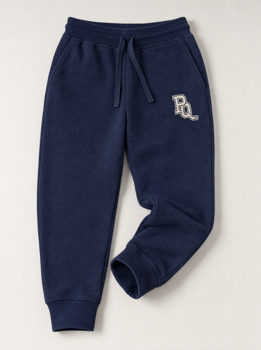 Navy Puck Queens heavyweight fleece sweatpants with cream PQ monogram embroidered at the left thigh
